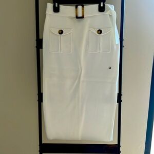 Beautiful cream color pencil skirt with plenty of stretch. Wear it fall/summer
